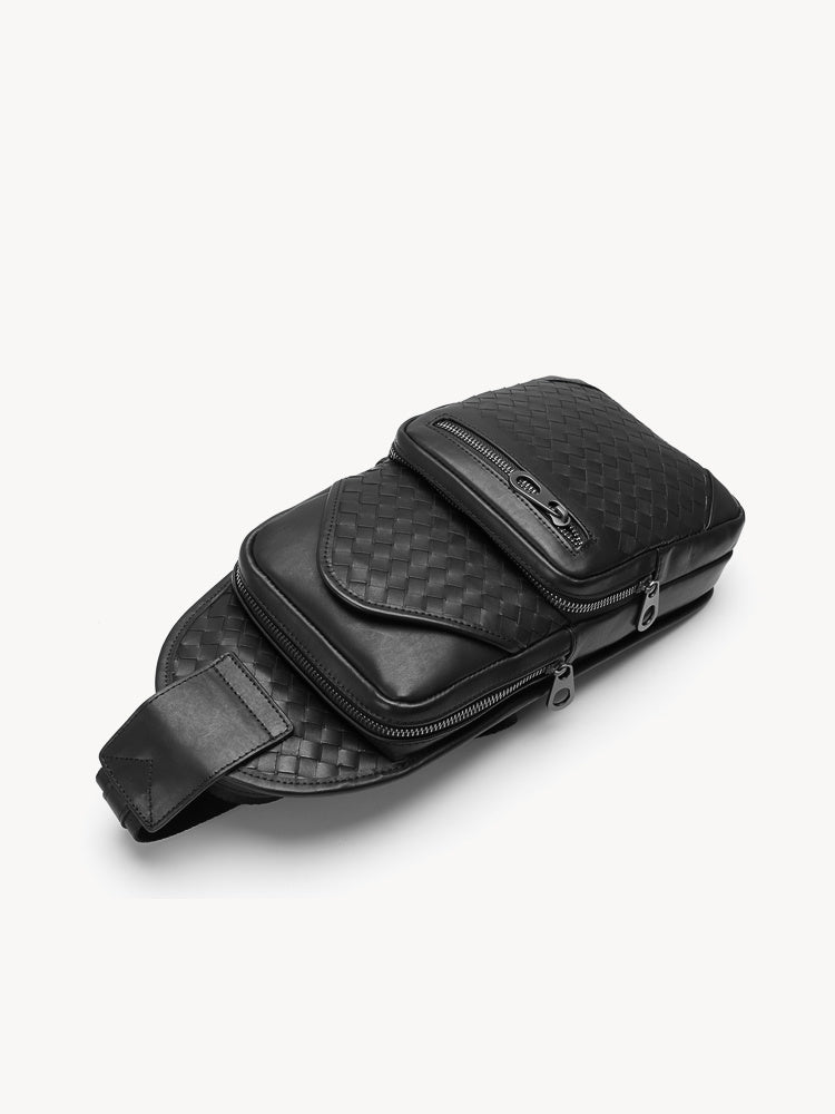 Black leather waist bag with checkered pattern on a white background