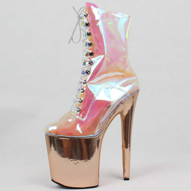 Holographic high-heeled boot on a light gray background