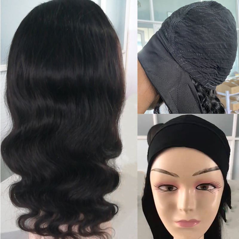 Black wig with different styling options on a mannequin head.