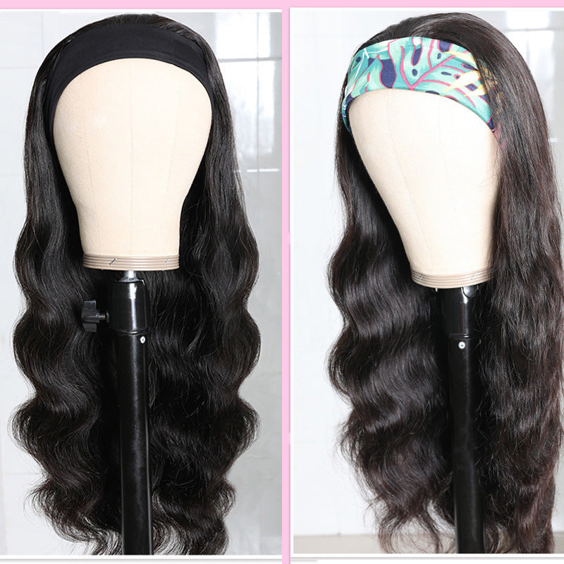 Two mannequins with long, wavy black hair on a white background.