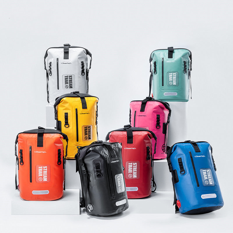 Collection of colorful waterproof bags on a white background