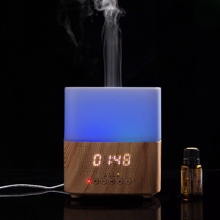 A humidifier with a wooden design and digital display, emitting steam on a black background.