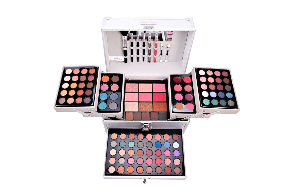 Makeup palette with various colors on a white background