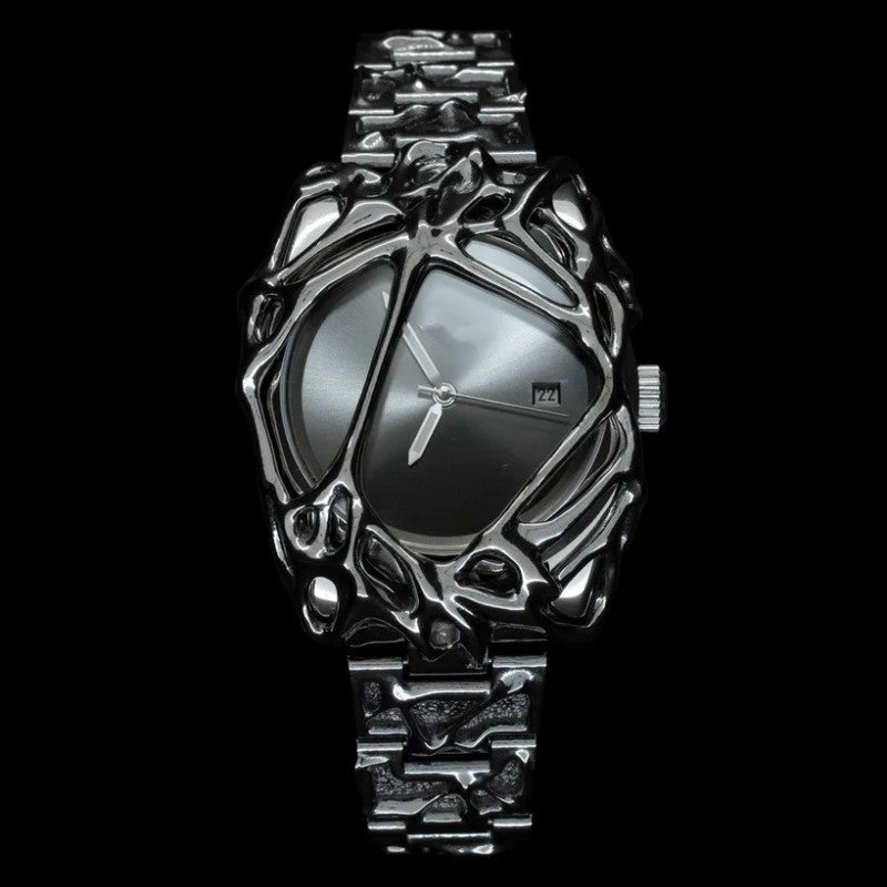 Silver skull-themed watch on a black background