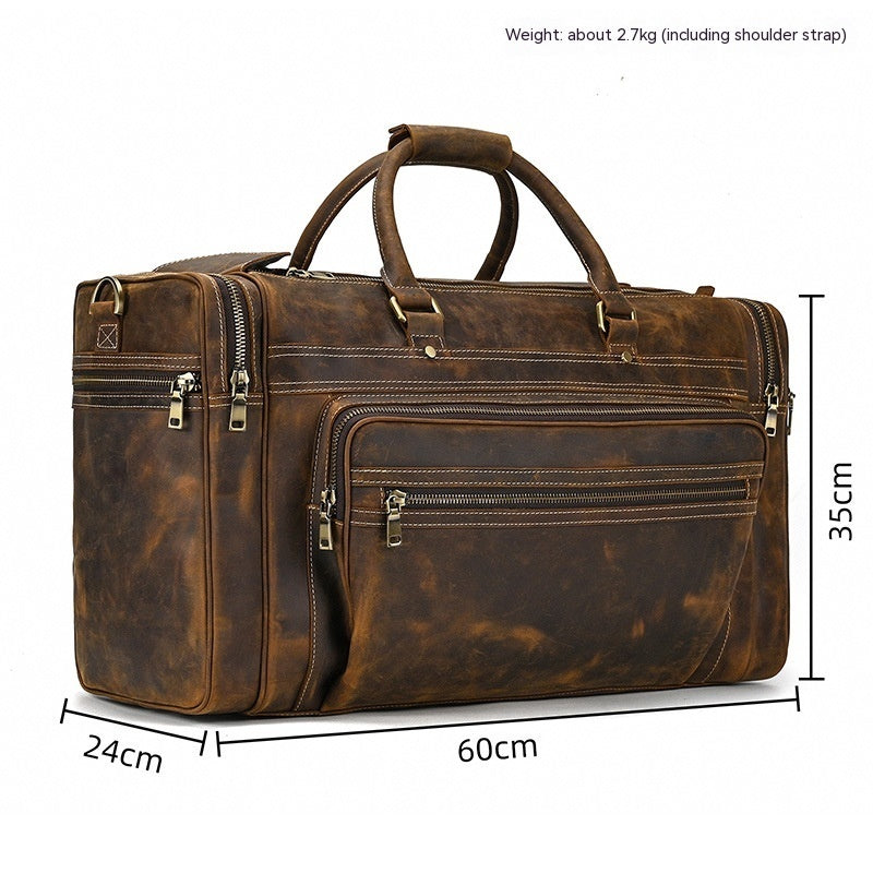 Brown leather duffel bag with measurements on a white background