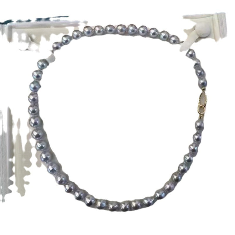Pearl necklace on a white background