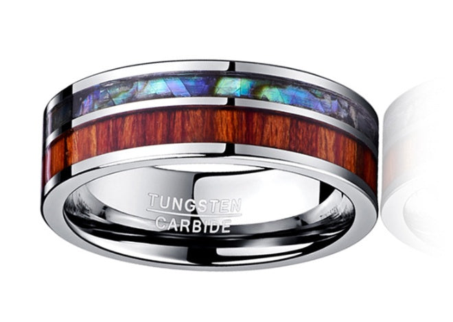 Tungsten carbide ring with wooden and abalone inlay on a white background