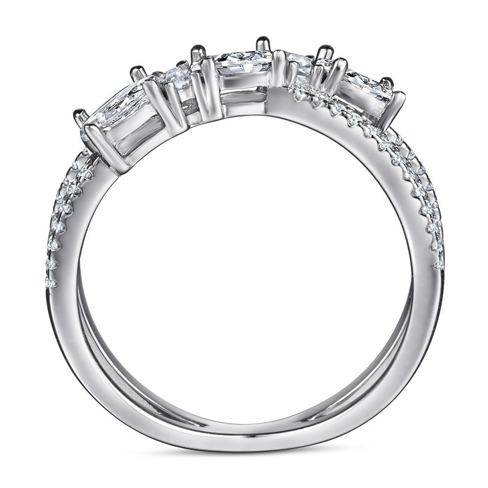 Diamond ring with a white gold band on a white background
