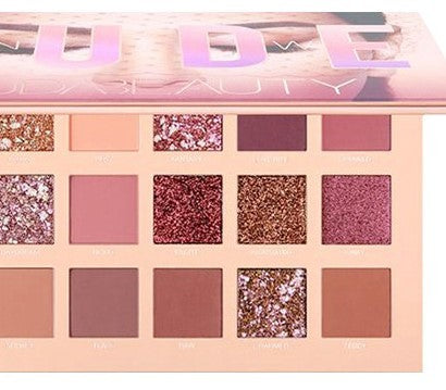 Makeup palette with various colors and glittery shades, featuring the brand 'UDEE BEAUTY'.