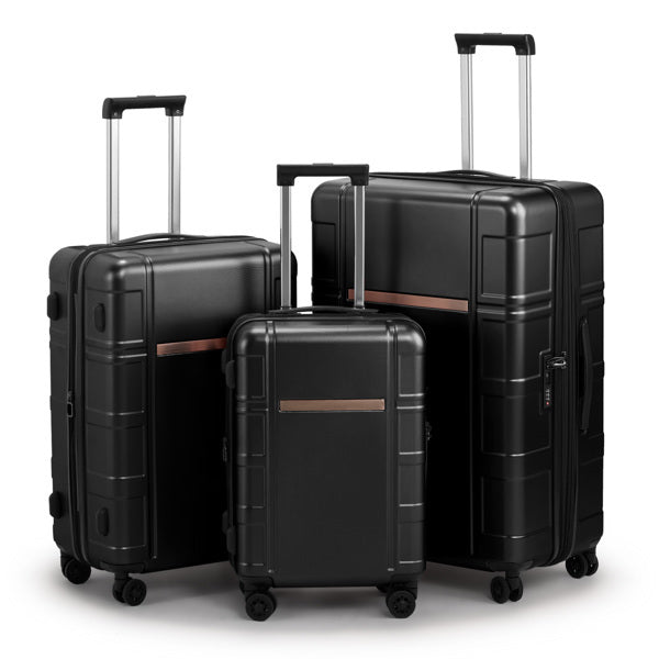 Three black suitcases of different sizes on a white background
