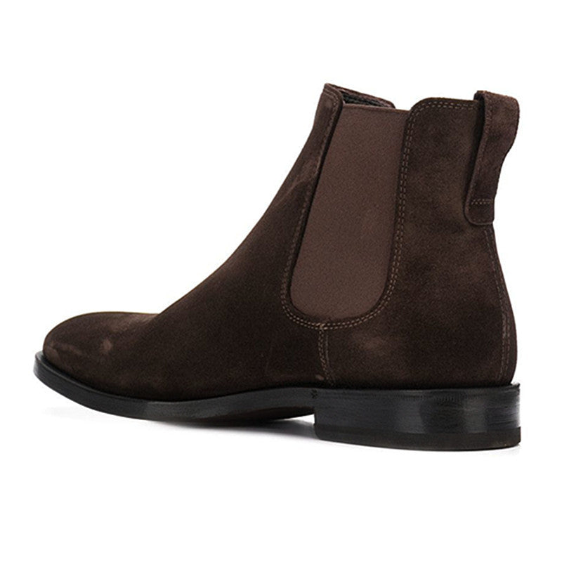 Brown suede Chelsea boot on a white background