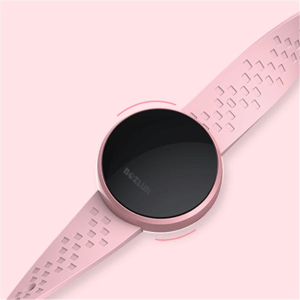 Pink smartwatch with a black screen on a light pink background
