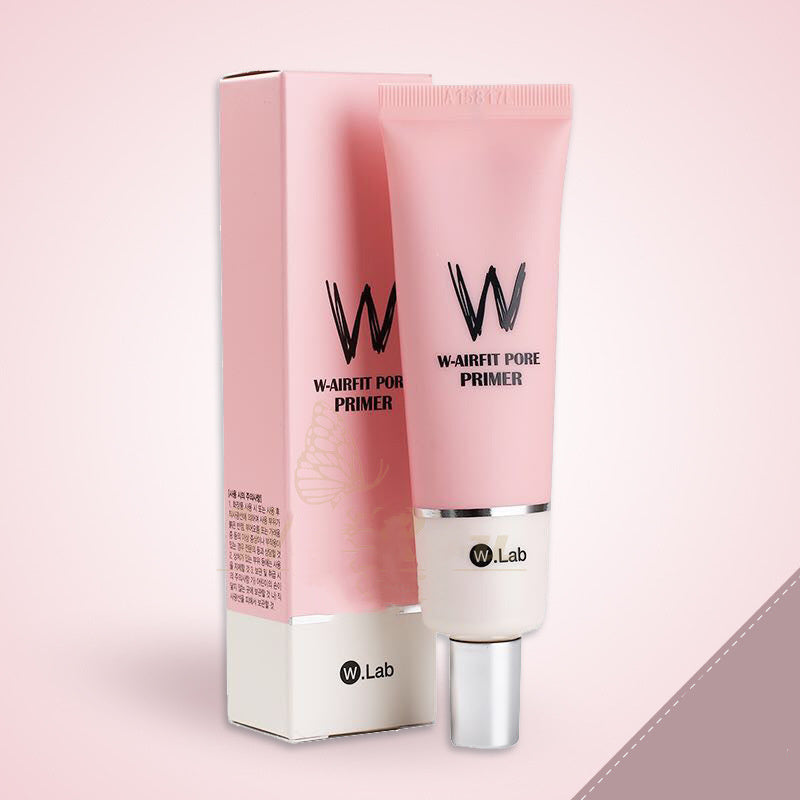 W-Lab pore primer tube and packaging on a pink background