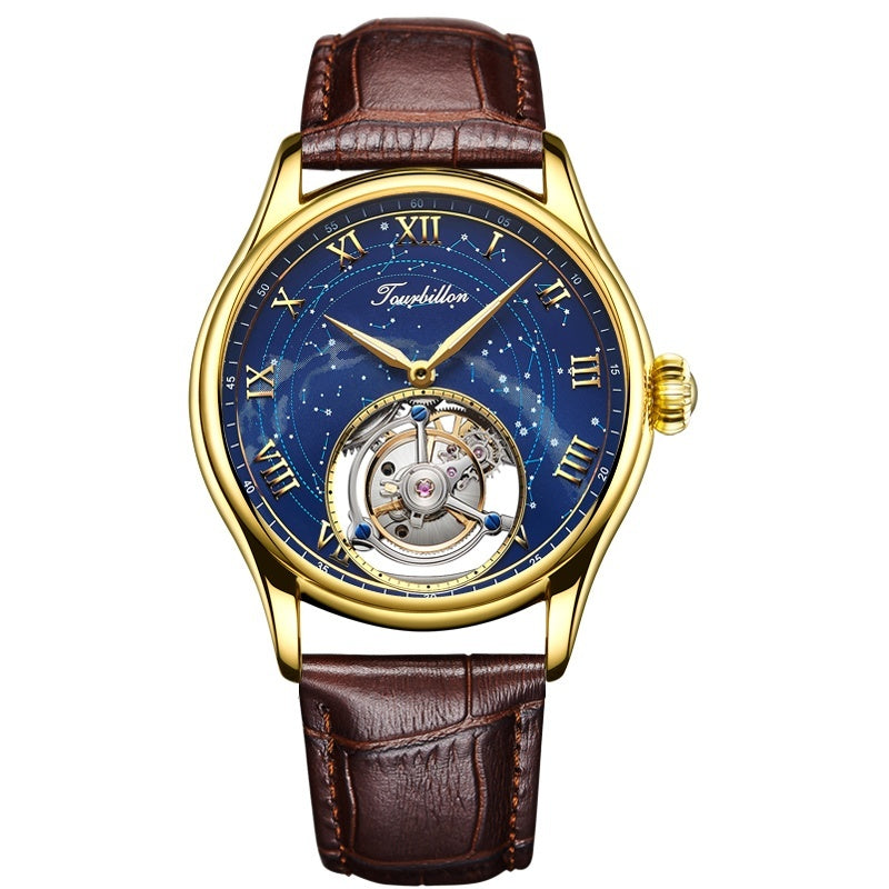 Luxury watch with gold case, blue dial, and brown leather strap on a white background
