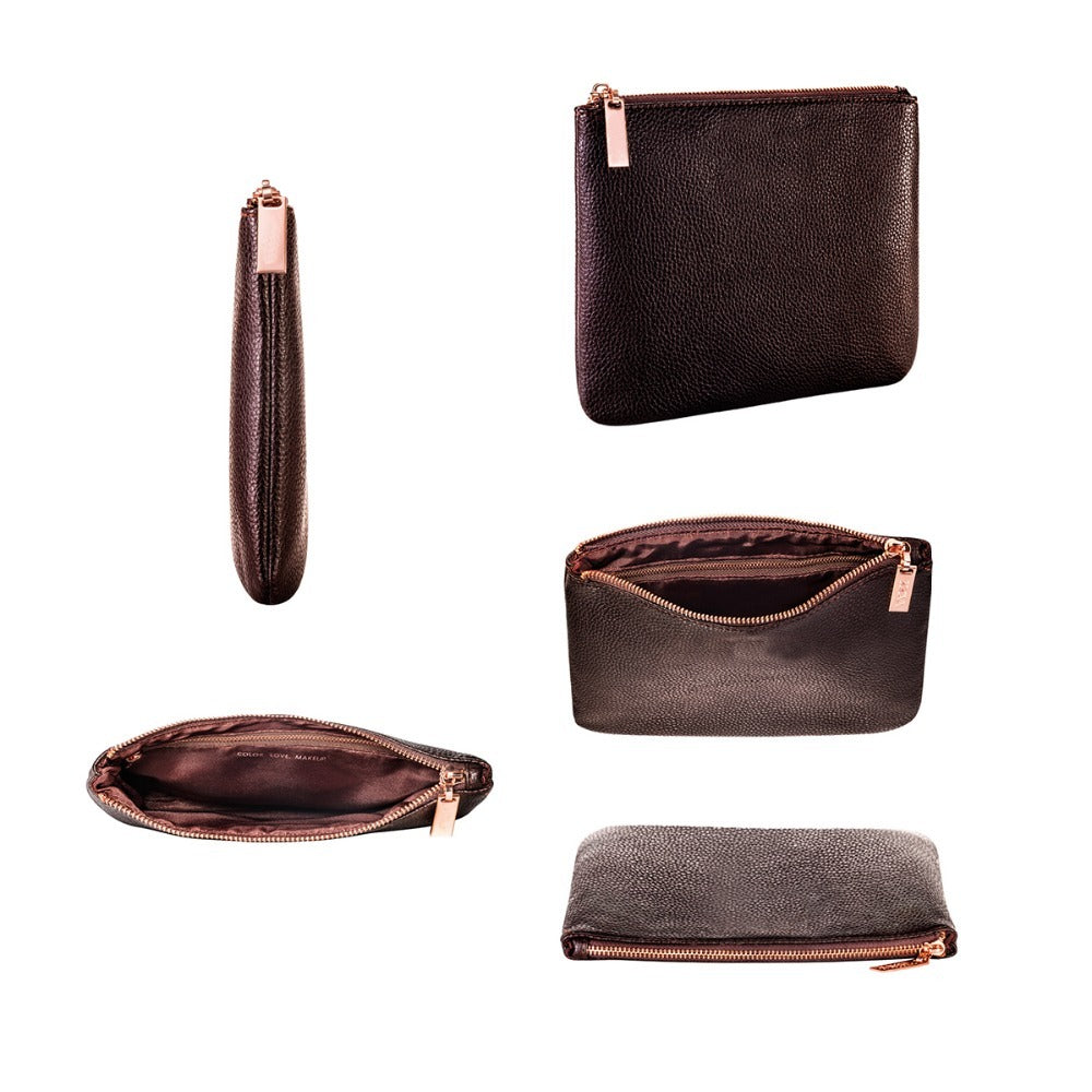 Set of brown leather pouches with rose gold zippers on a white background