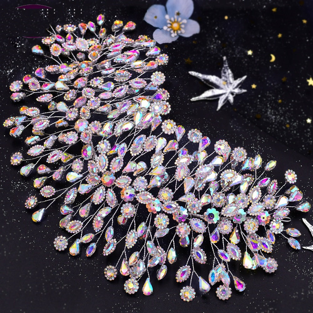 Decorative brooches with rhinestones on a dark background