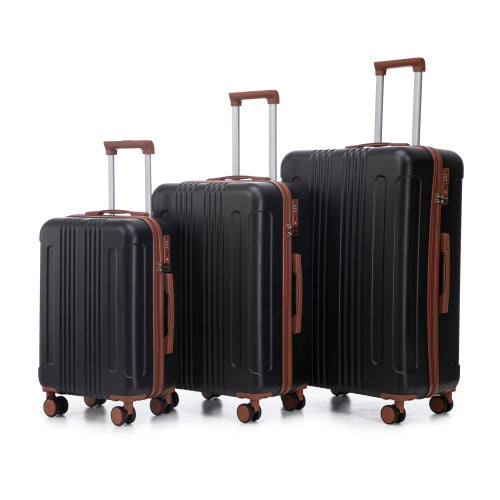 Set of black suitcases with brown accents on a white background
