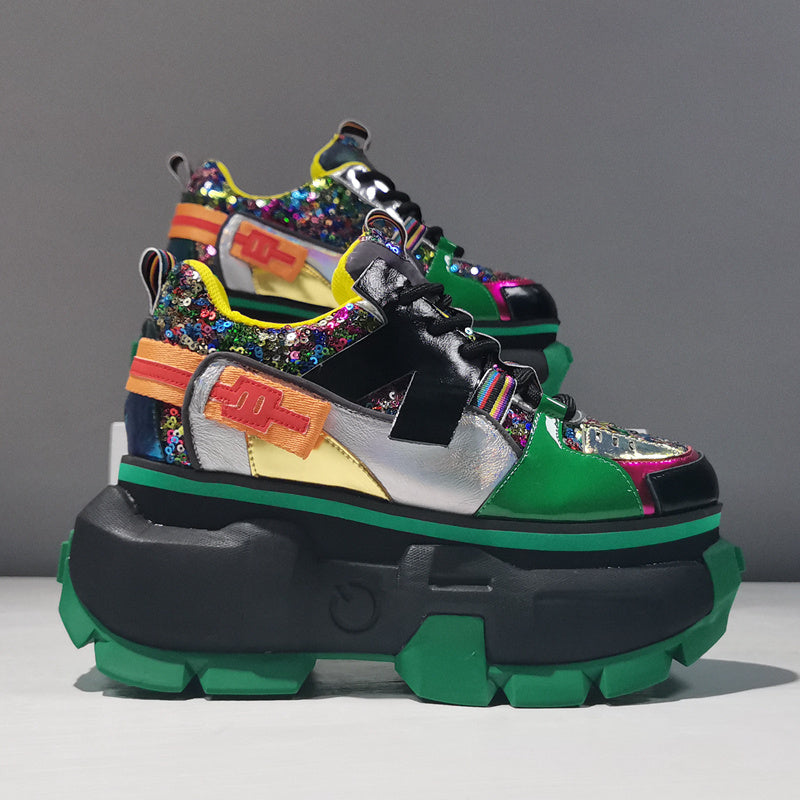 Colorful platform sneakers with a multicolor design on a gray background