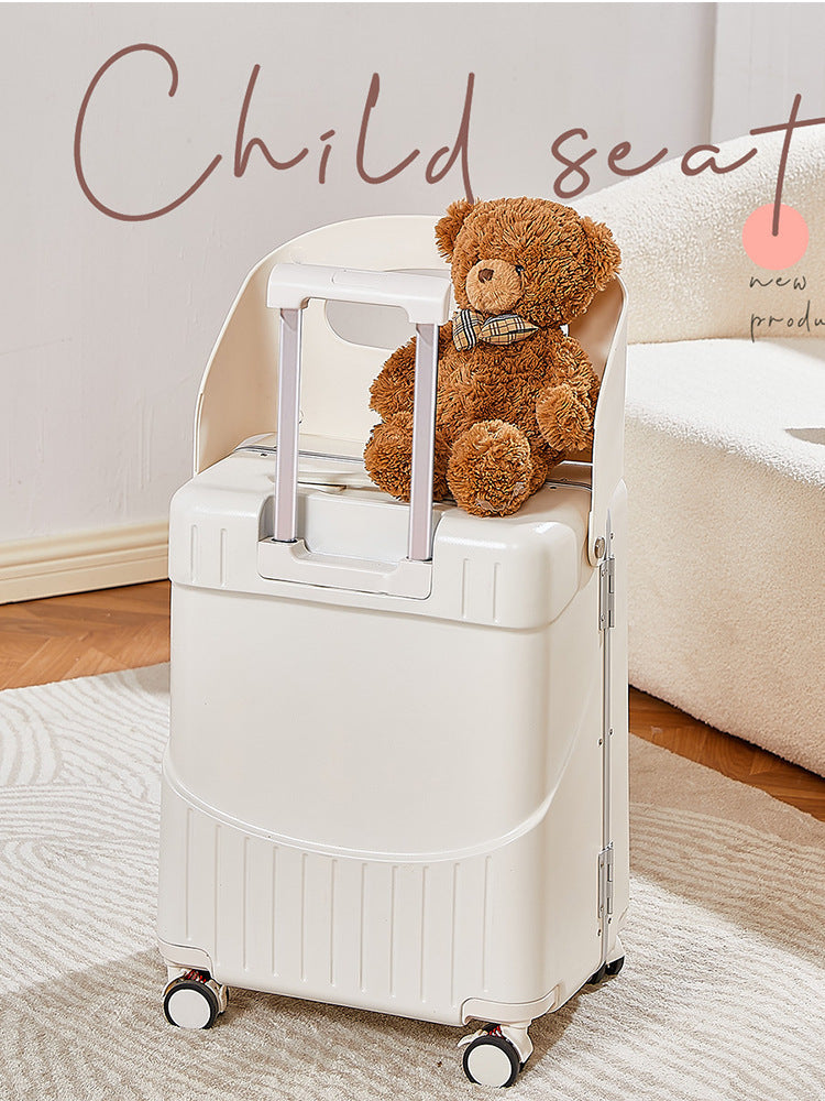 White child seat with a teddy bear on top, placed indoors.