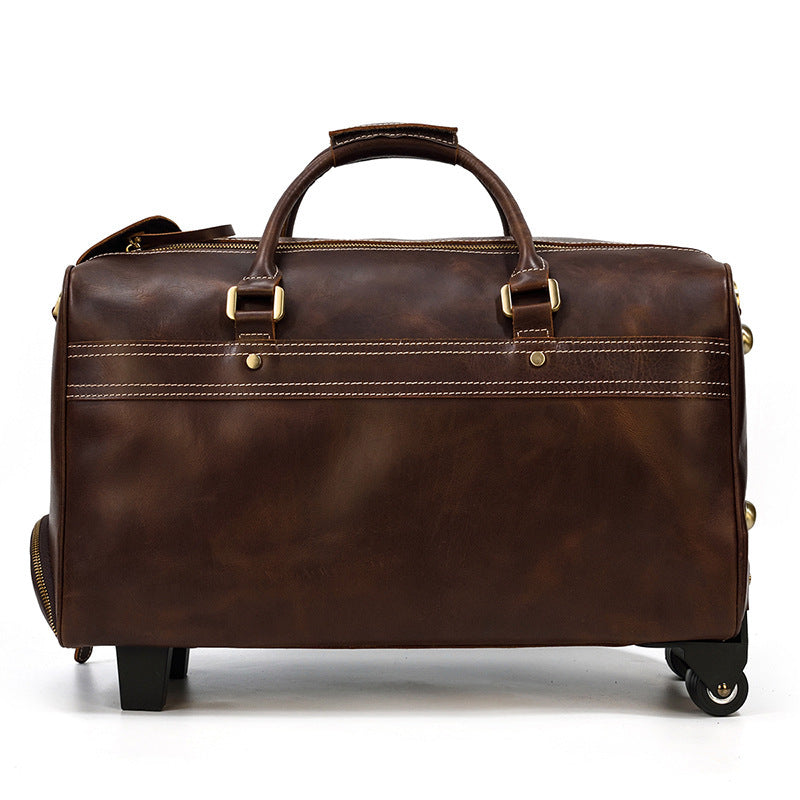 Brown leather duffel bag with wheels on a white background