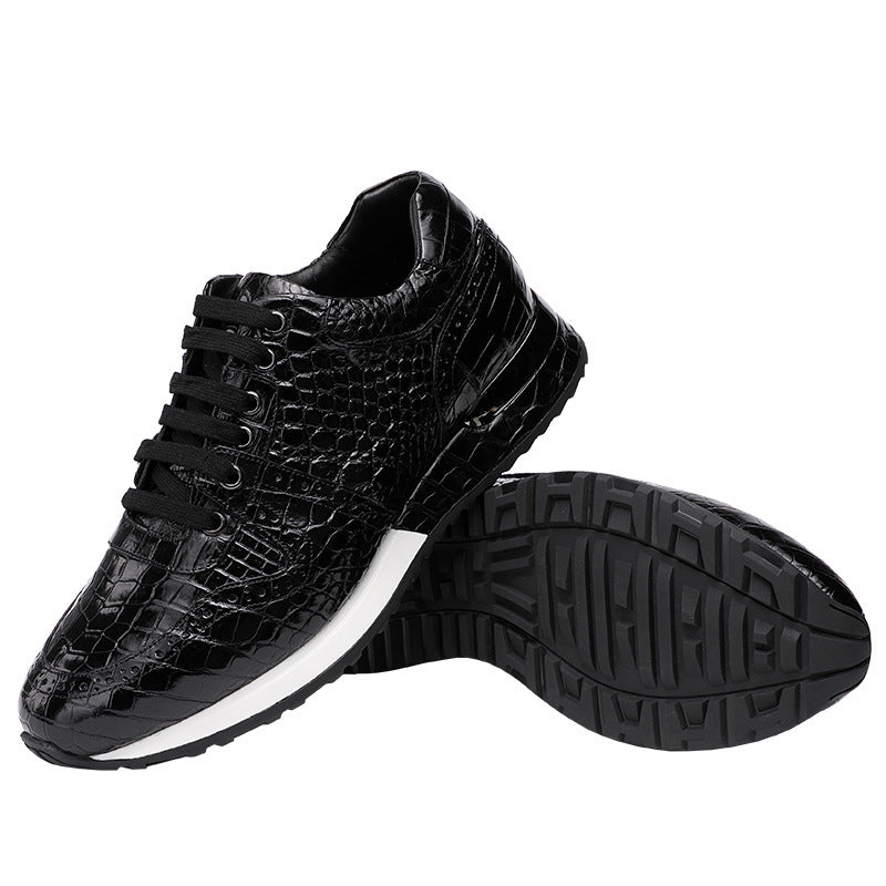 Black textured sneaker with white sole on a white background
