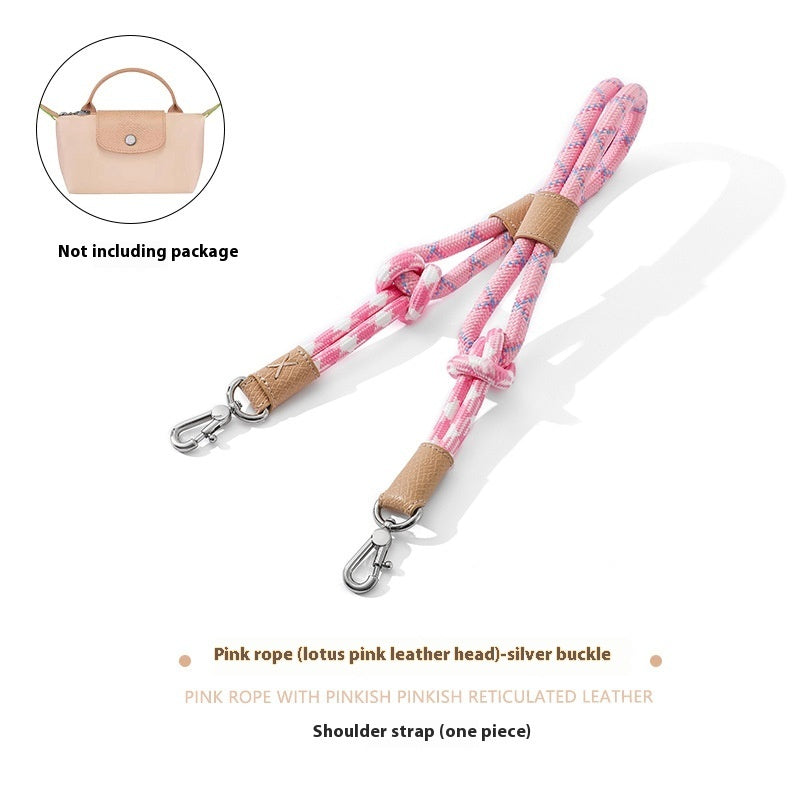 Pink rope shoulder strap with silver buckle on a white background
