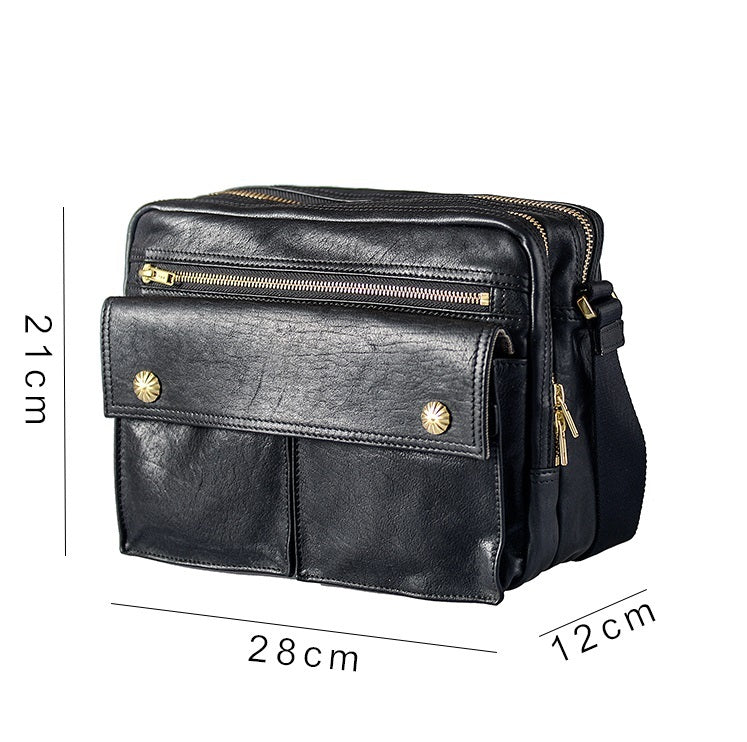 Black leather bag with gold zippers and studs, shown with dimensions on a white background