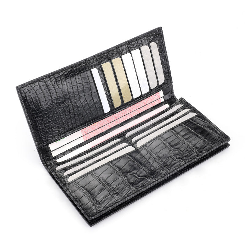 Black crocodile-patterned wallet with multiple card slots on a white background