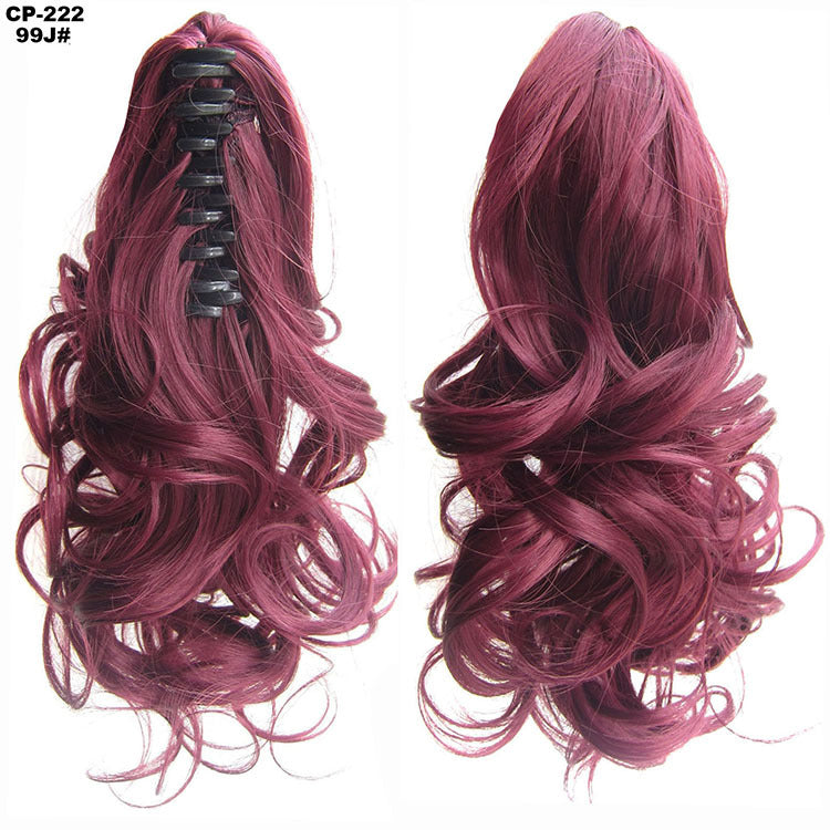Pink hair extension with clip on the left and styled on the right against a white background