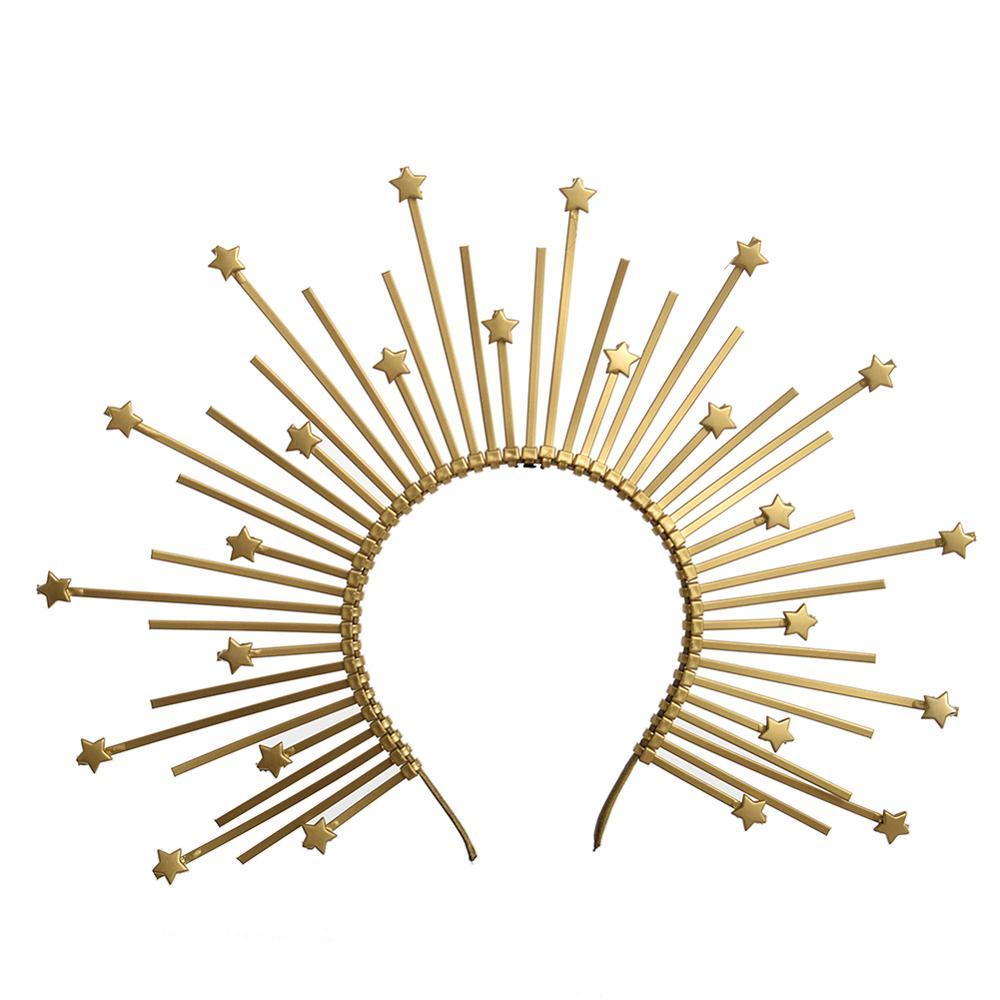 Decorative gold sunburst wall art on a white background