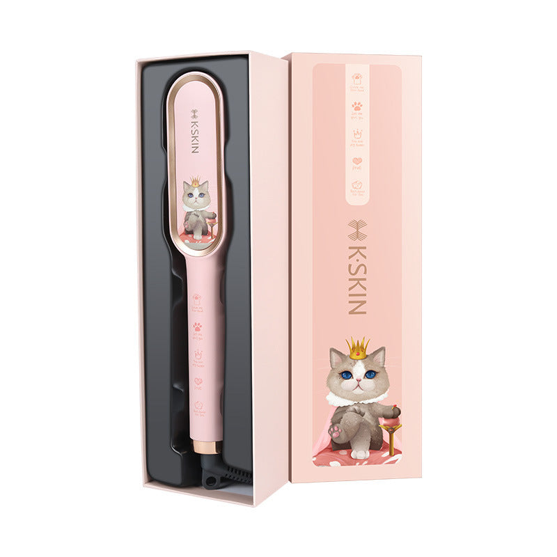 Pink hair straightener with cartoon cat design in packaging