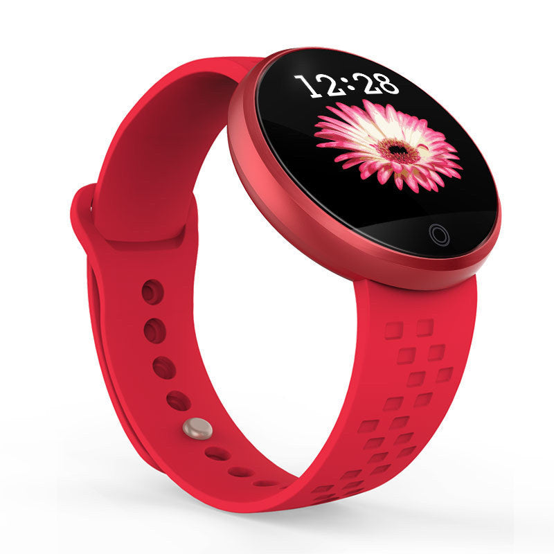 Red smartwatch with a floral display on a white background