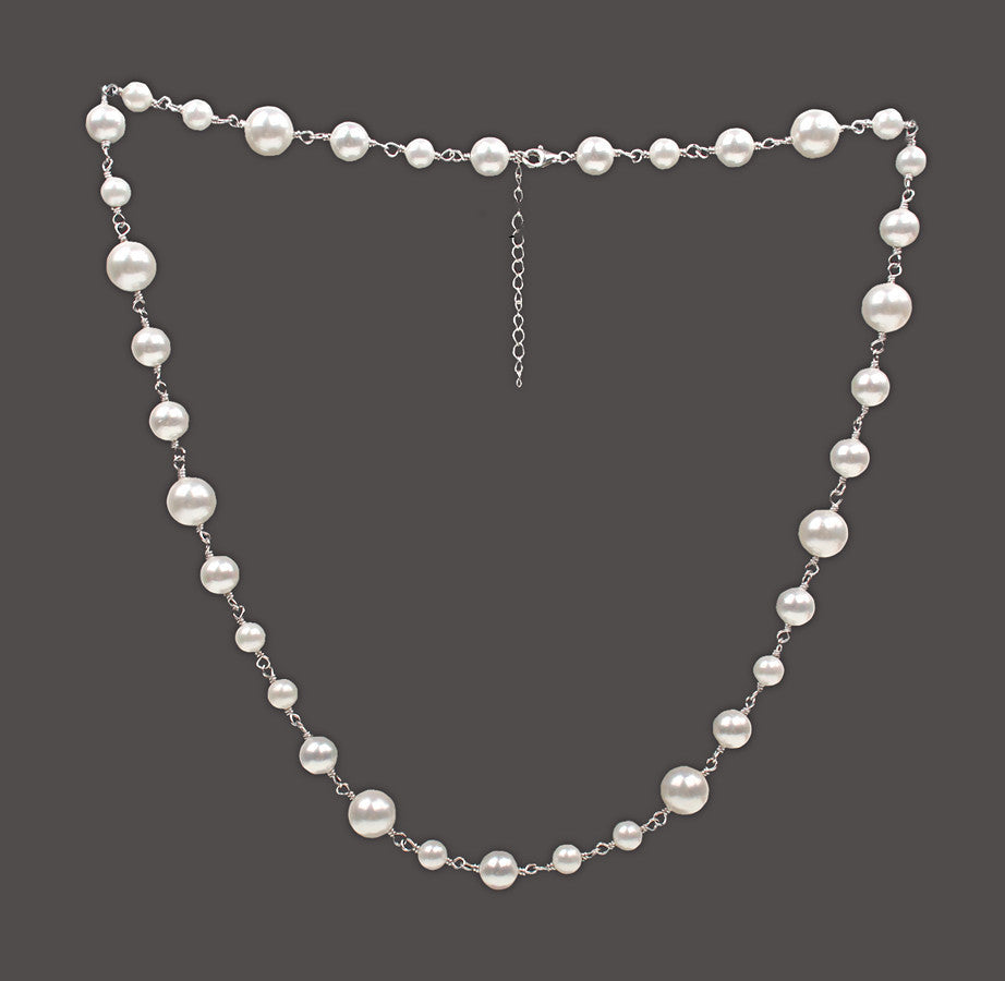 Pearl necklace on a dark background