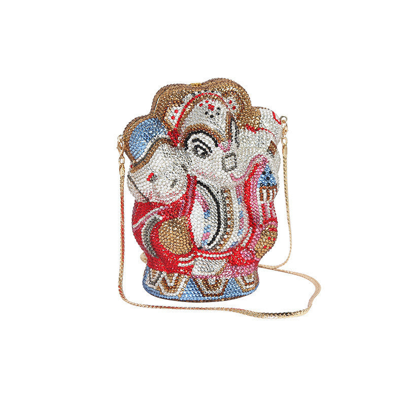 Colorful beaded handbag shaped like a deity figure on a white background