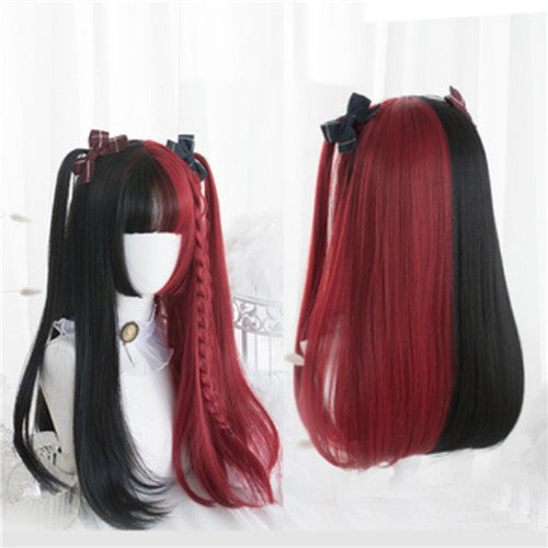 Two wigs with black and red hair on a white background