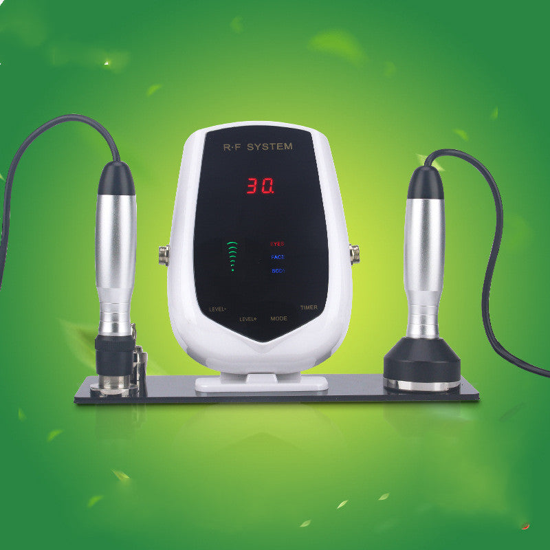RF system device with two attachments on a green background