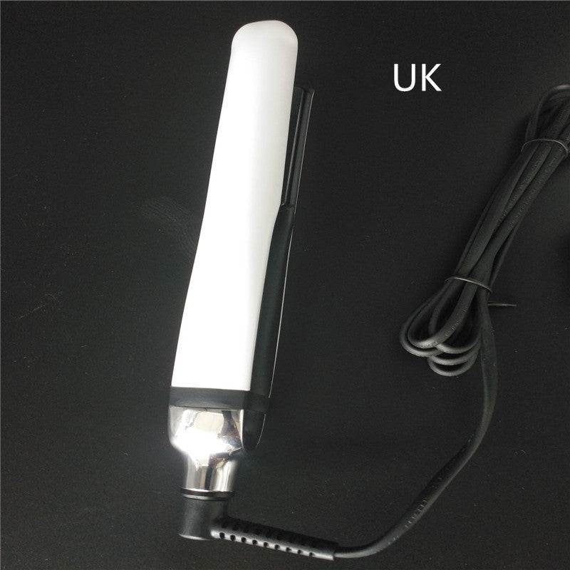 Hair straightener with a cord on a black background, labeled 'UK'.