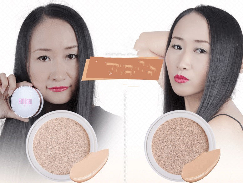 Two women holding makeup products with a focus on the product's color swatch.
