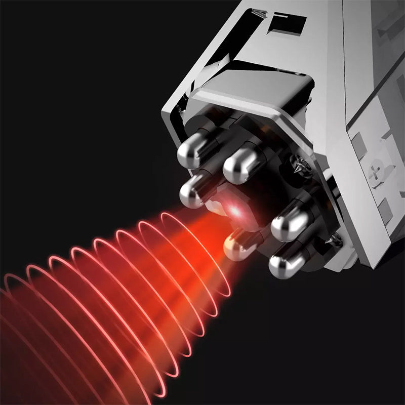 Close-up of a mechanical device with red glowing elements on a black background