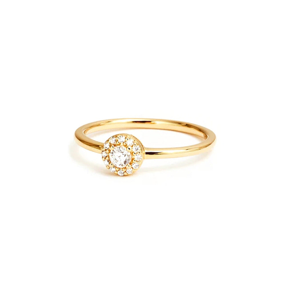 Gold ring with a diamond on a white background