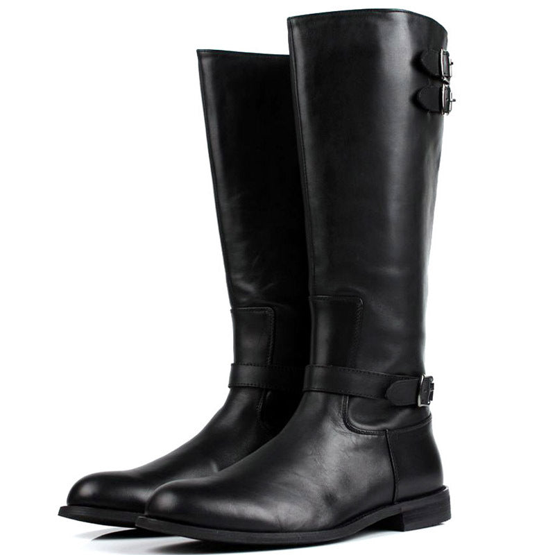 Pair of black leather knee-high boots with buckles on a white background