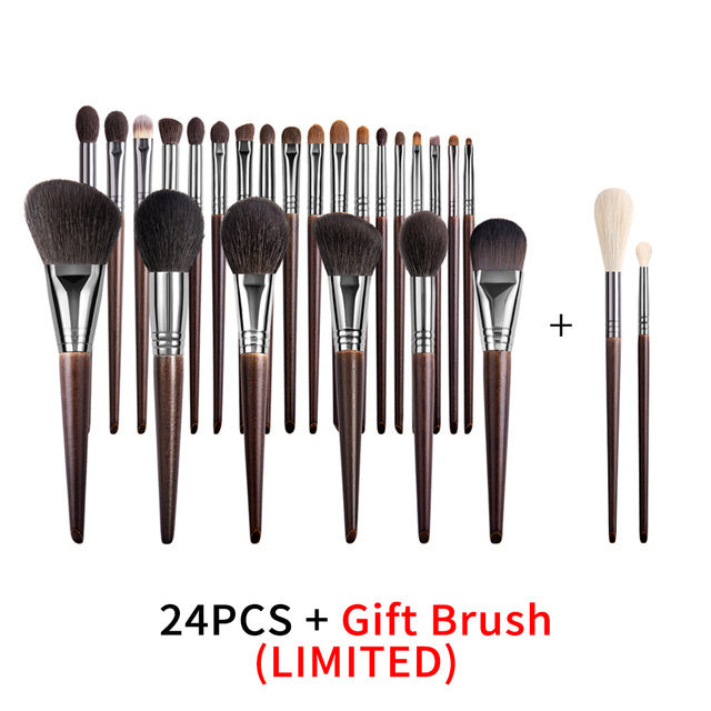 Set of 24 makeup brushes with a gift brush on a white background