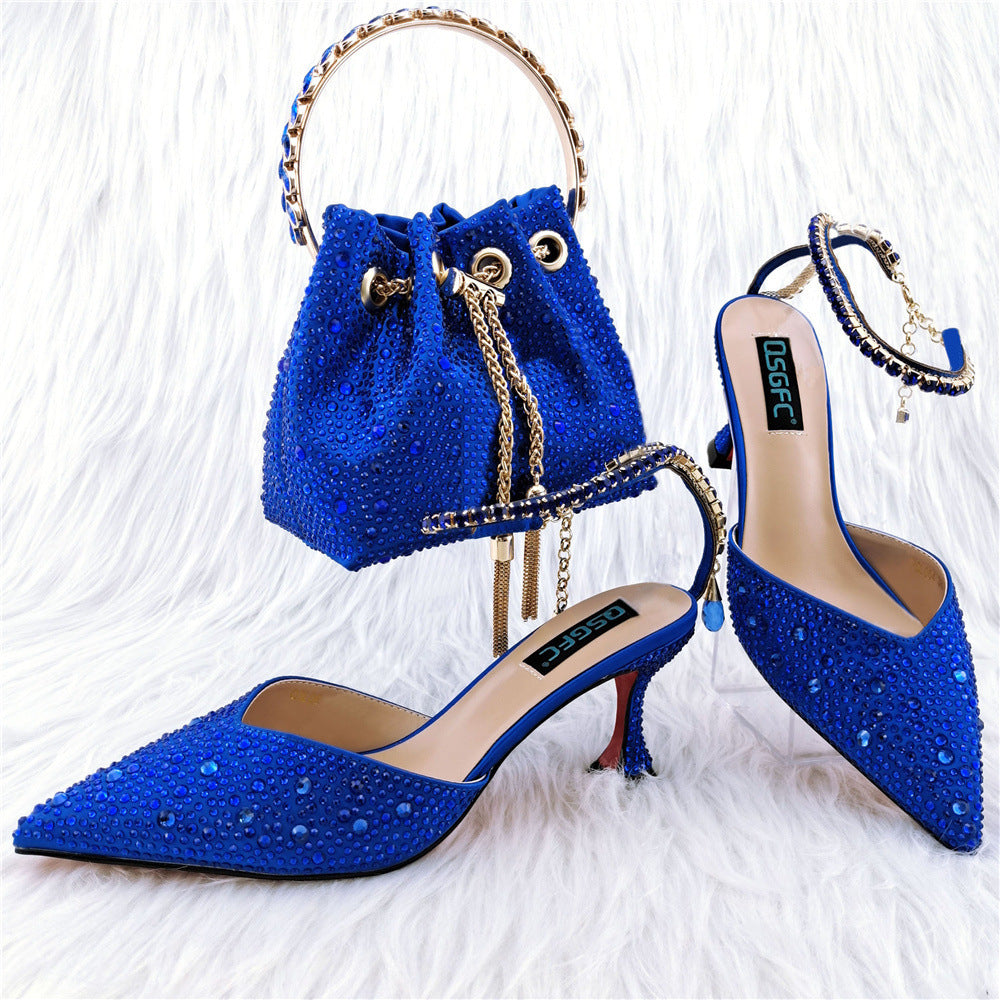 Blue high-heeled shoes and matching handbag on a white background