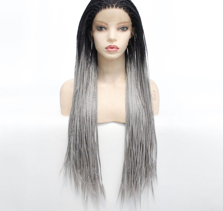 Mannequin head with a gray ombre wig on a white background