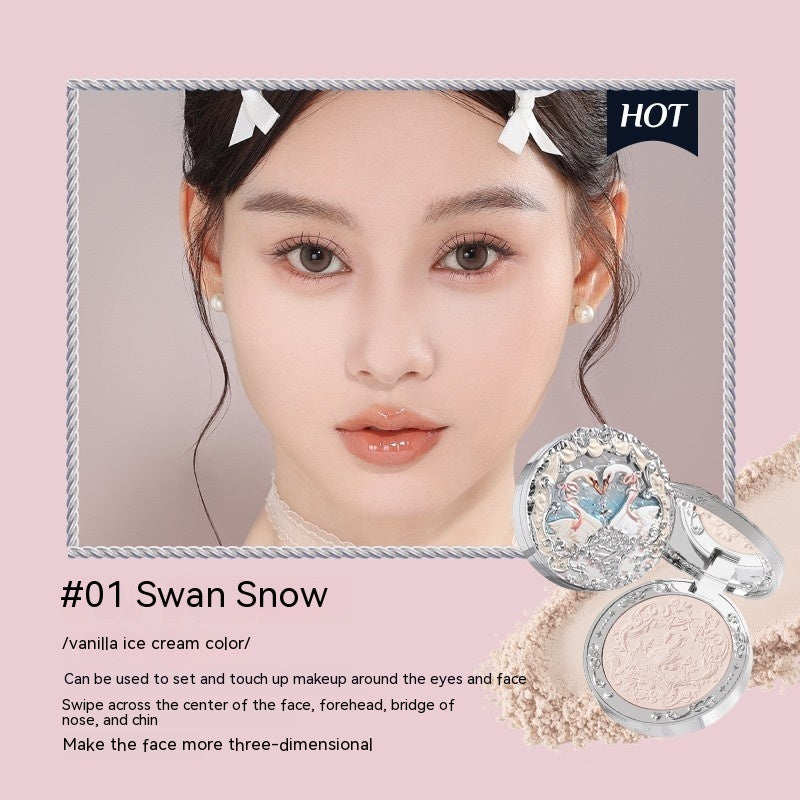 Makeup product with a compact and brush on a pink background, featuring text about the product's color and usage.