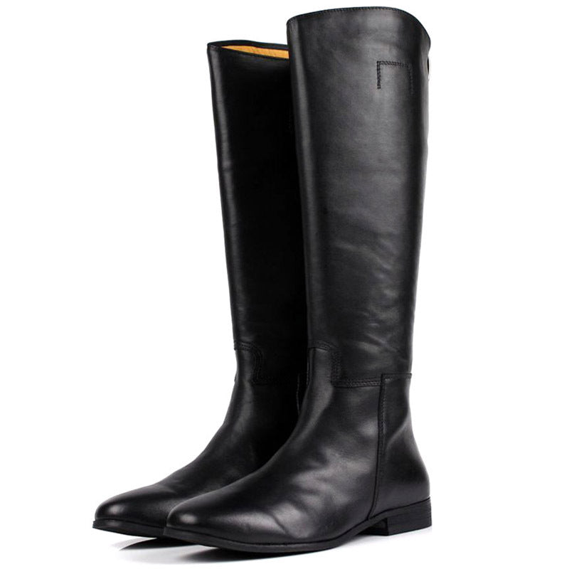 Pair of black knee-high boots on a white background