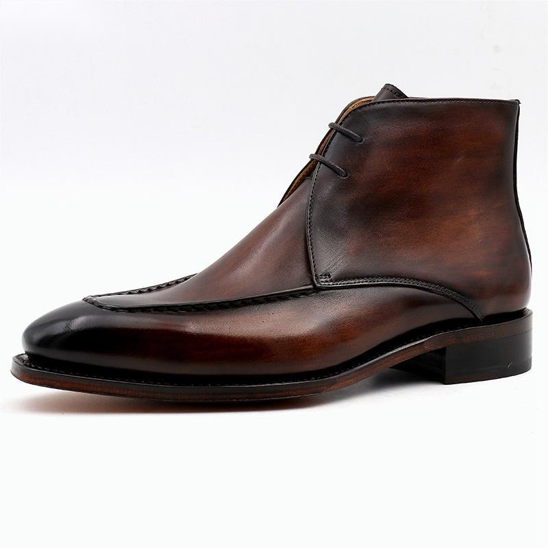 Brown leather dress shoe on a white background