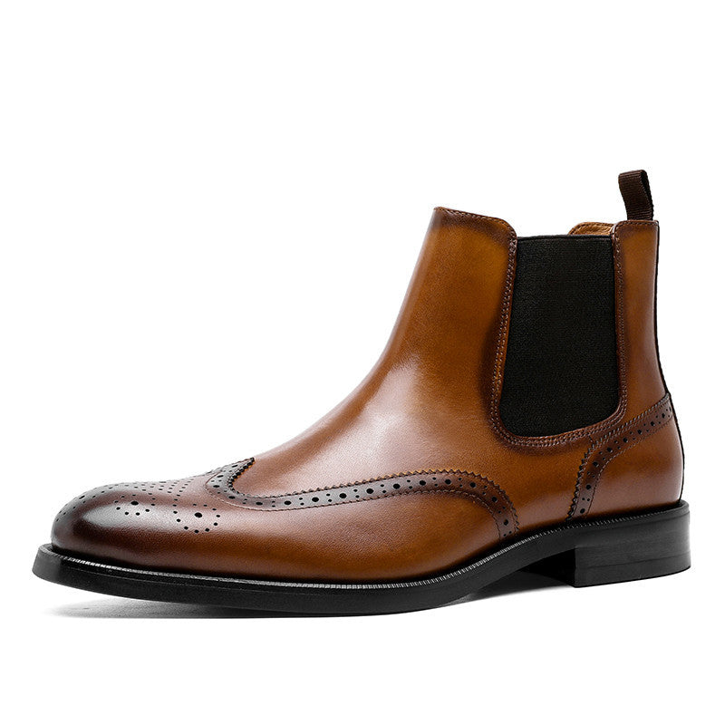 Brown leather Chelsea boot on a white background