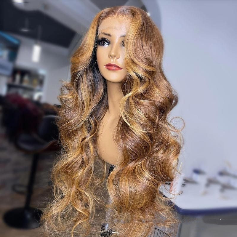 Mannequin head with long, wavy, blonde wig in a blurred indoor setting