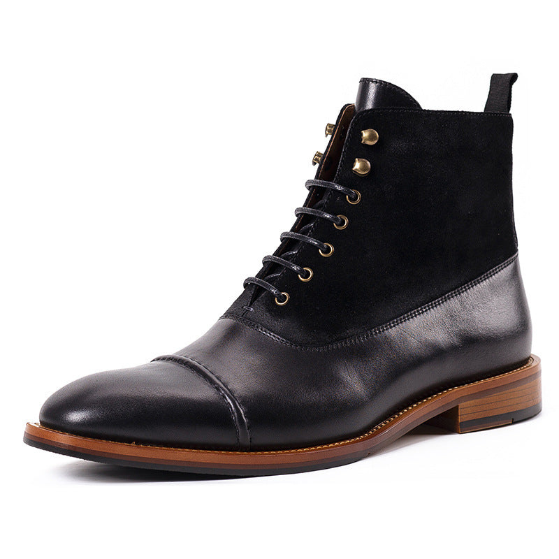Black leather boot with brown sole on a white background